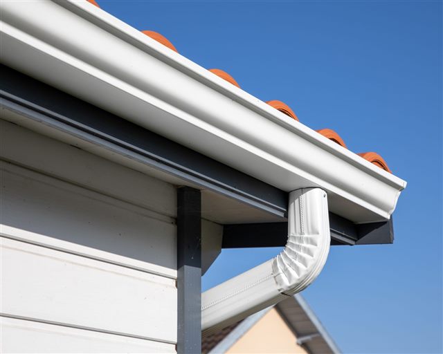 Residential gutter and downspout detail | King Contracting, serving Iowa
