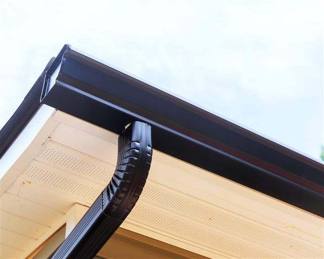 Residential gutter and downspout detail | King Contracting, serving Iowa